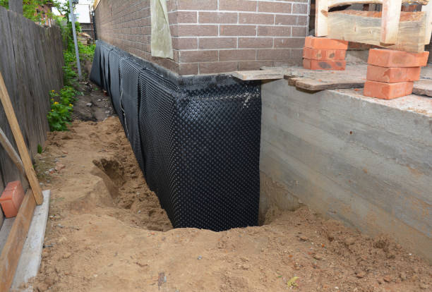 SJ Waterproofing Pros technician performing targeted Exterior Waterproofing assessment in Weidman, MI